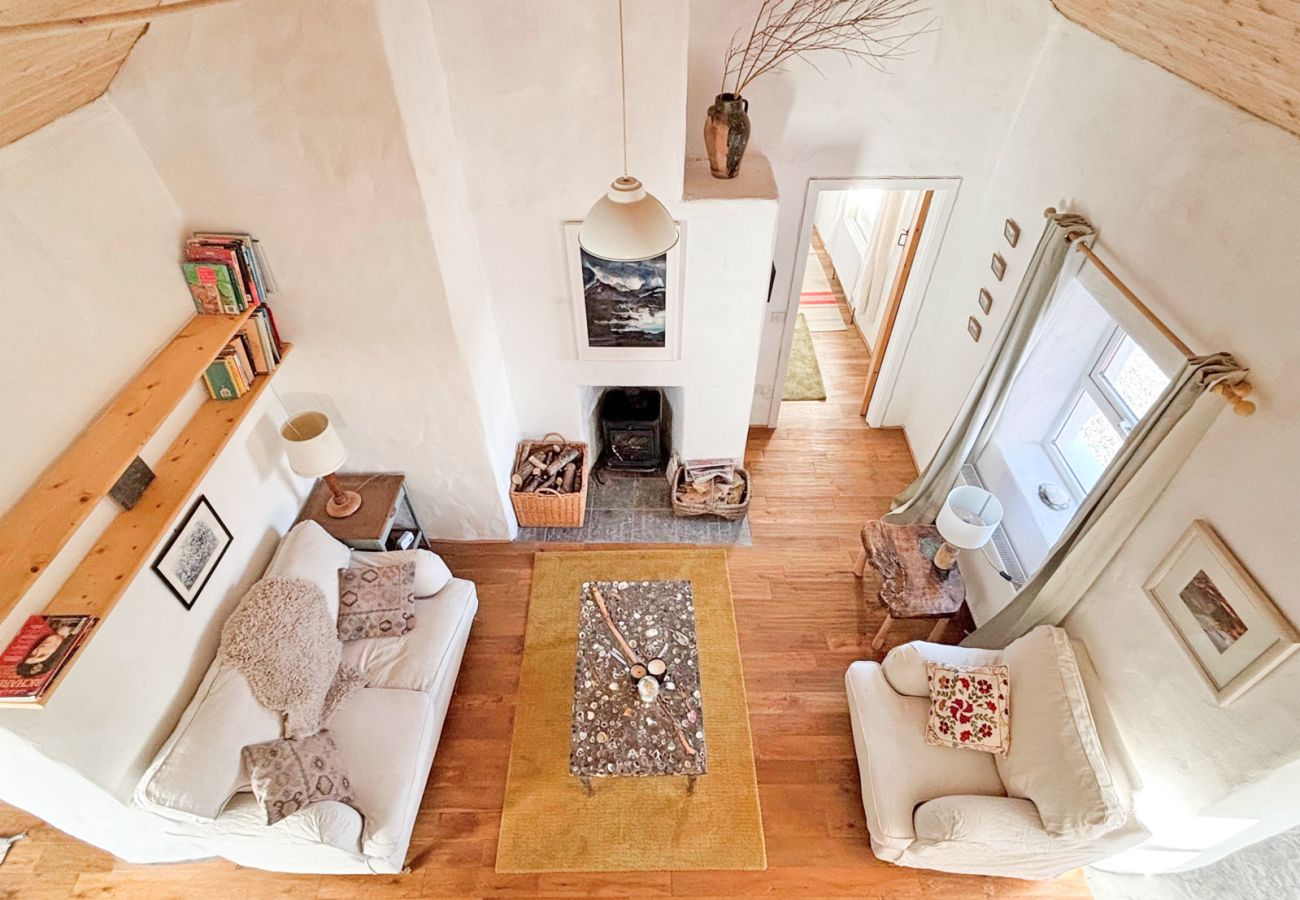 Moyard Stone Cottage, Connemara.  Country cottage style, wooden floors, white wash walls. 