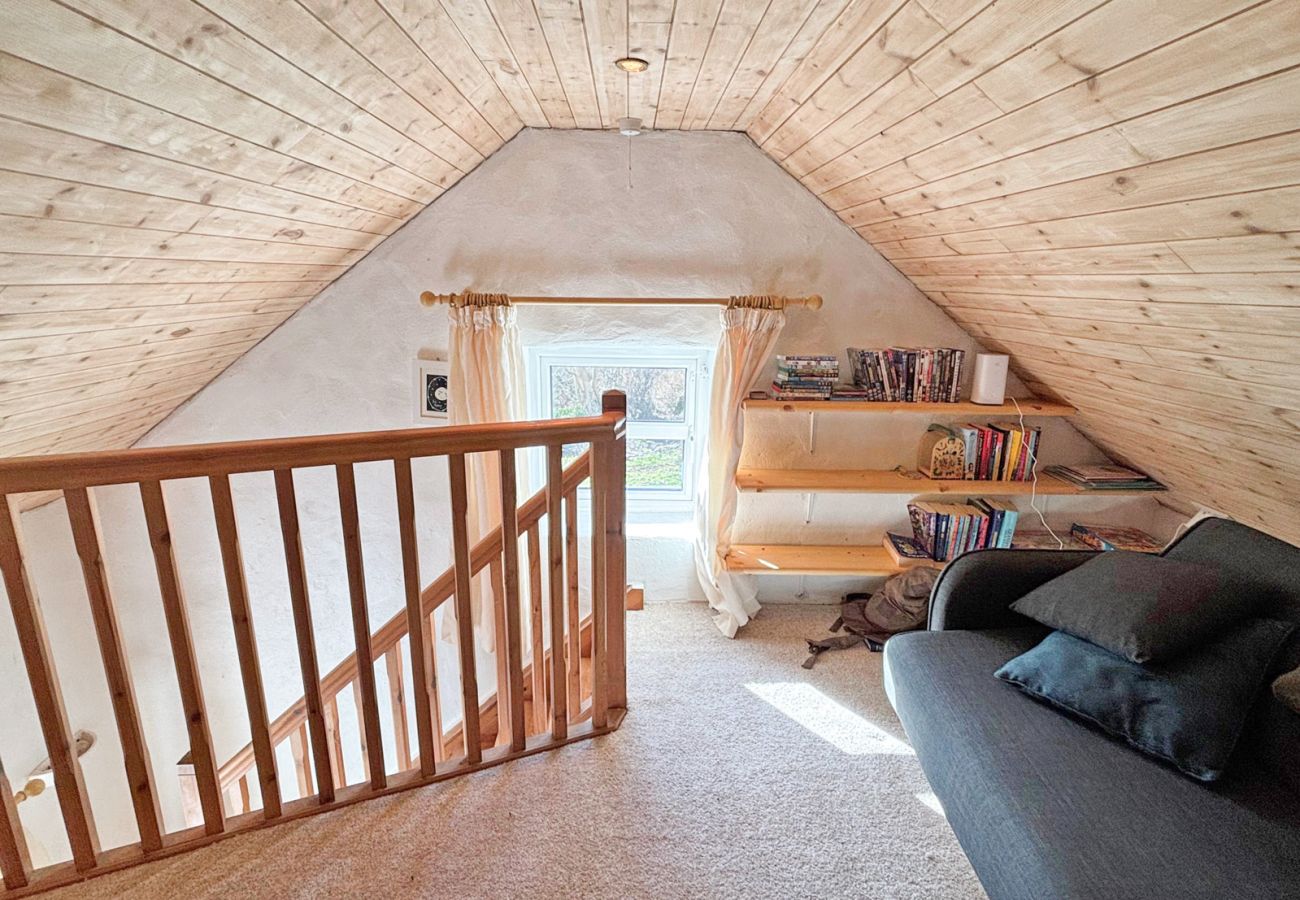 Moyard Stone Cottage, Connemara.  Mezzanine couch and TV