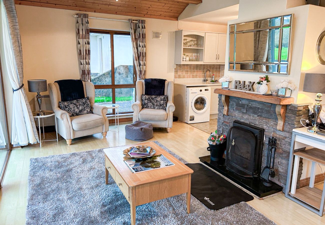 Glasson Mews Holiday Home No. 2. Open plan living room kitchen. Open Fire, comfort. 