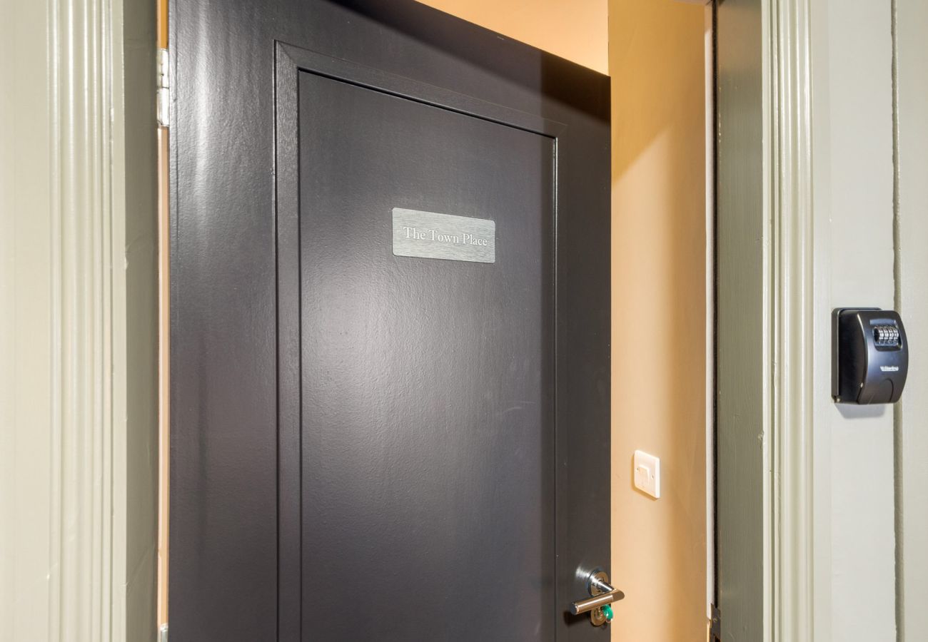 The Town Place Apartment Clifden. Front door with lock box. 