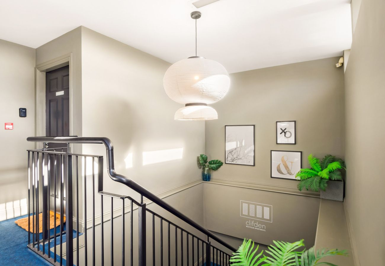 The Town Place Apartment Clifden. Modern lobby with stairwell. 