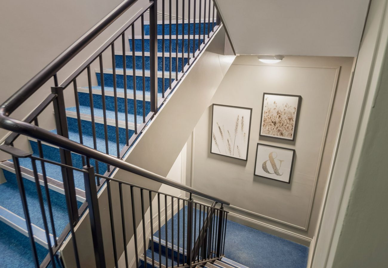 The Town Place Apartment Clifden. Modern lobby with stairwell. 