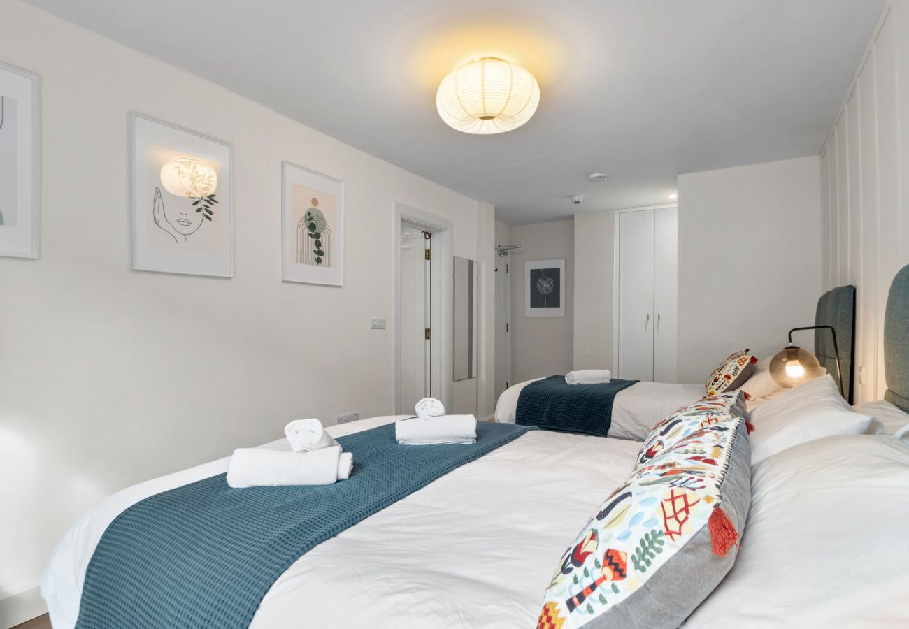 Clifden Boutique Apartment. Super king size bed and single bed.  Tasteful modern style. 