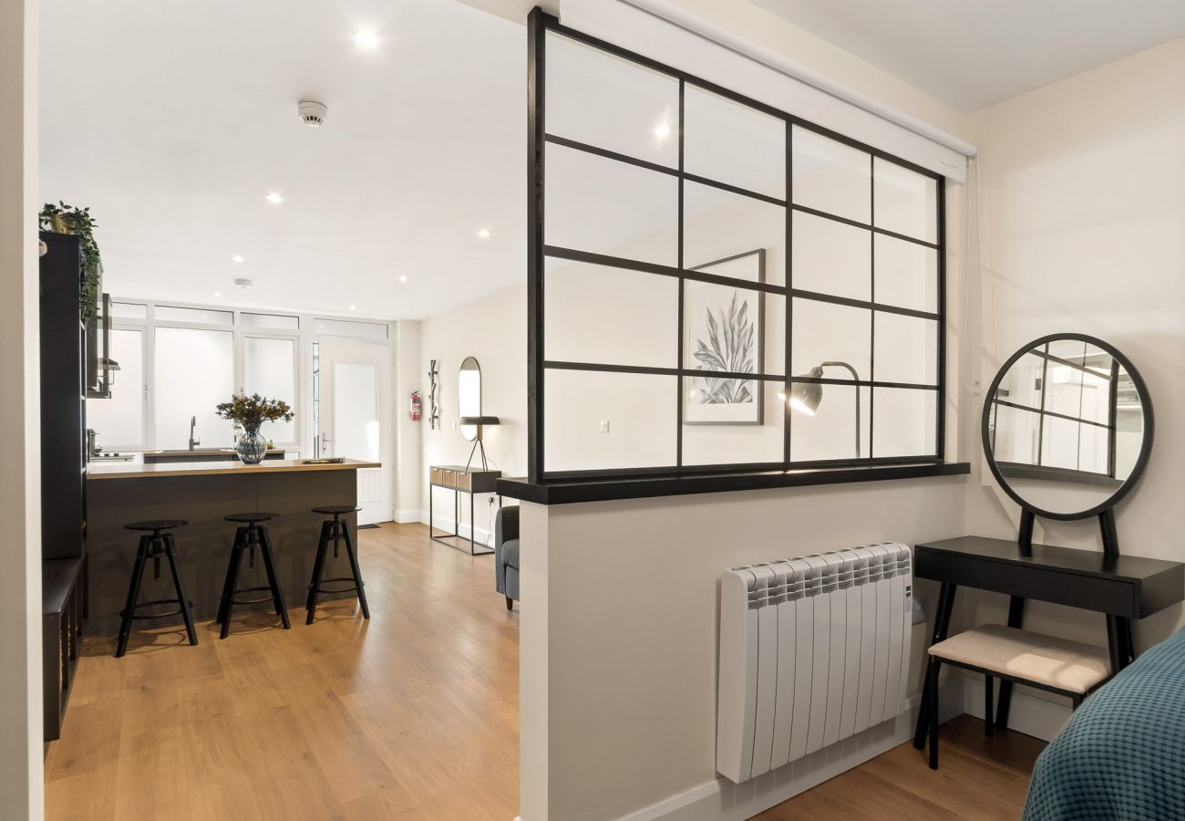 Town Centre Studio Clifden. double bed , divider into living area. 