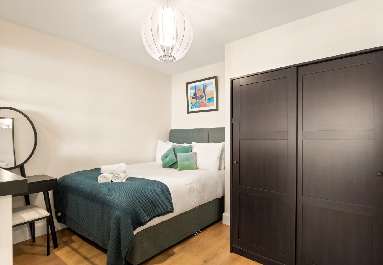 Town Centre Studio Clifden. double bed with storage. 