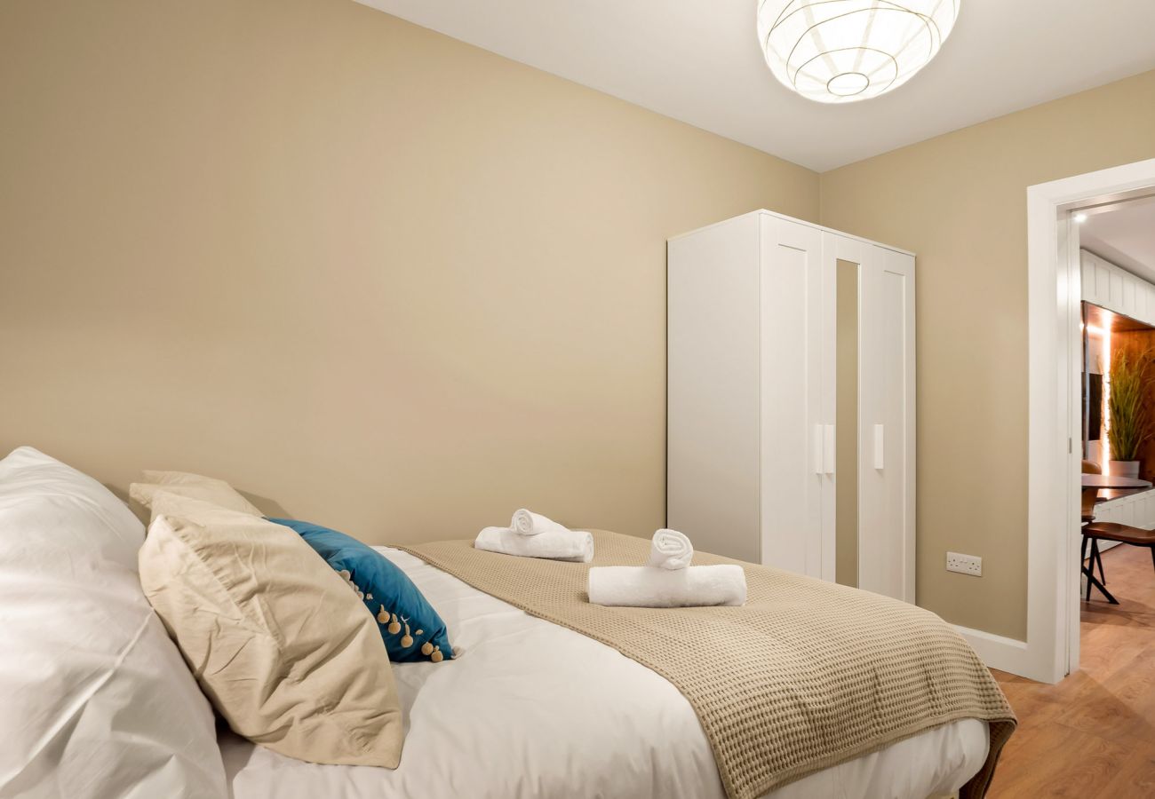 Main Street Hideaway Clifden. Double room with pull out single, bright contemporary design. 