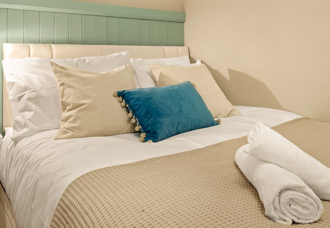 Main Street Hideaway Clifden. Double room with pull out single, bright contemporary design. 