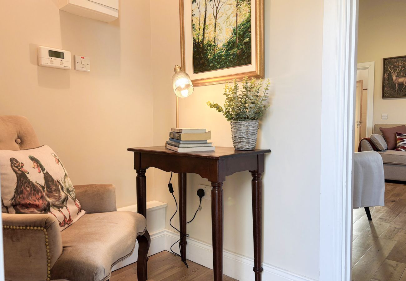 KylemoreWoodlandHolidayApartmentRef473. Armchair and table