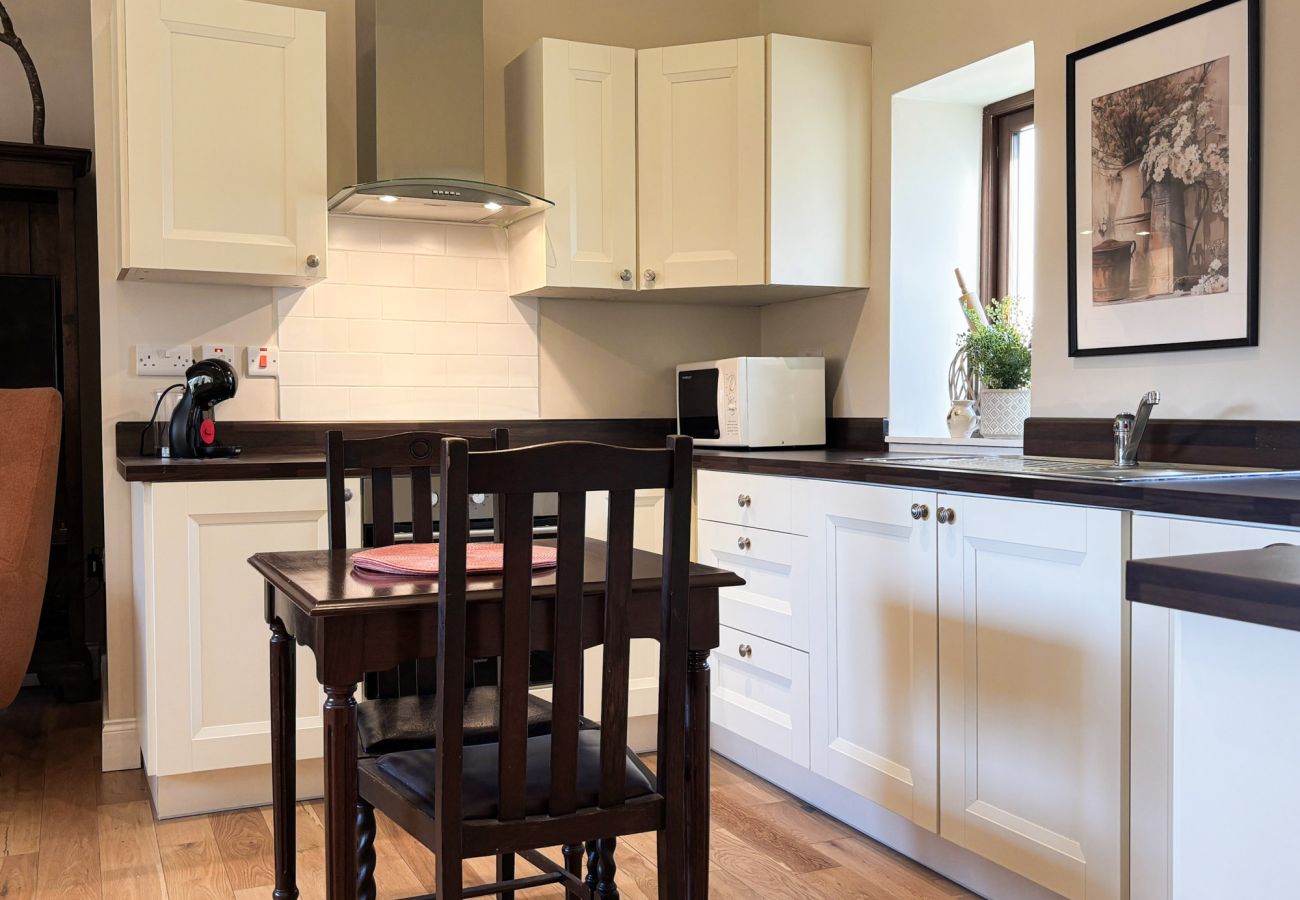 KylemoreWoodlandHolidayApartmentRef473. Dining table for two. Modern Kitchen