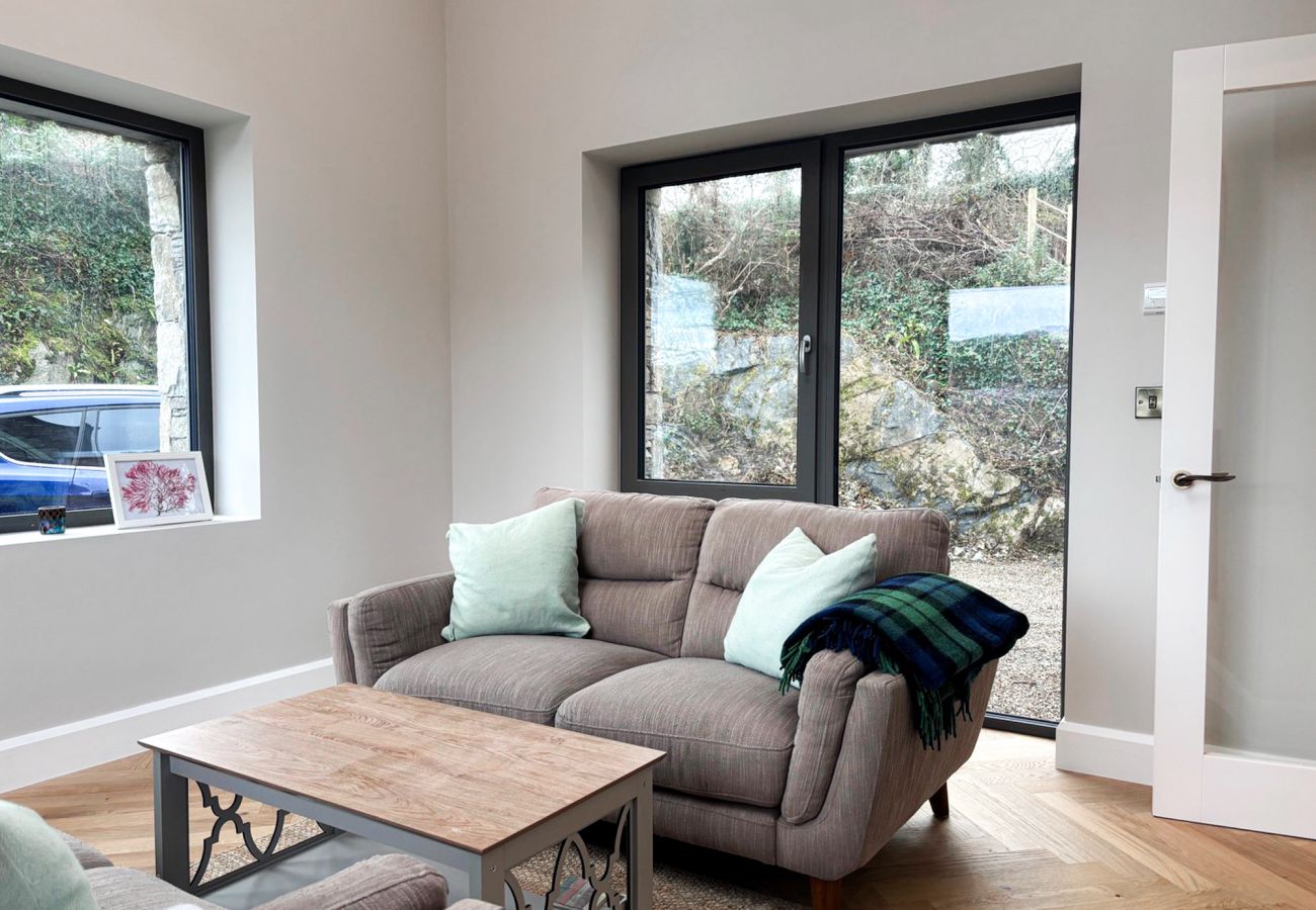 Clifden Holiday Home. Modern luxury home. Modern couch with pull out sofa. 