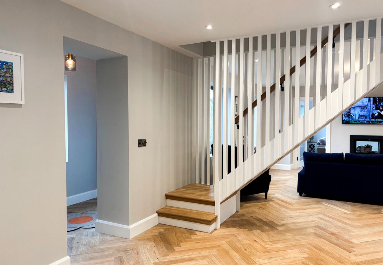 Clifden Holiday Home. Modern luxury home. Open plan stairs.