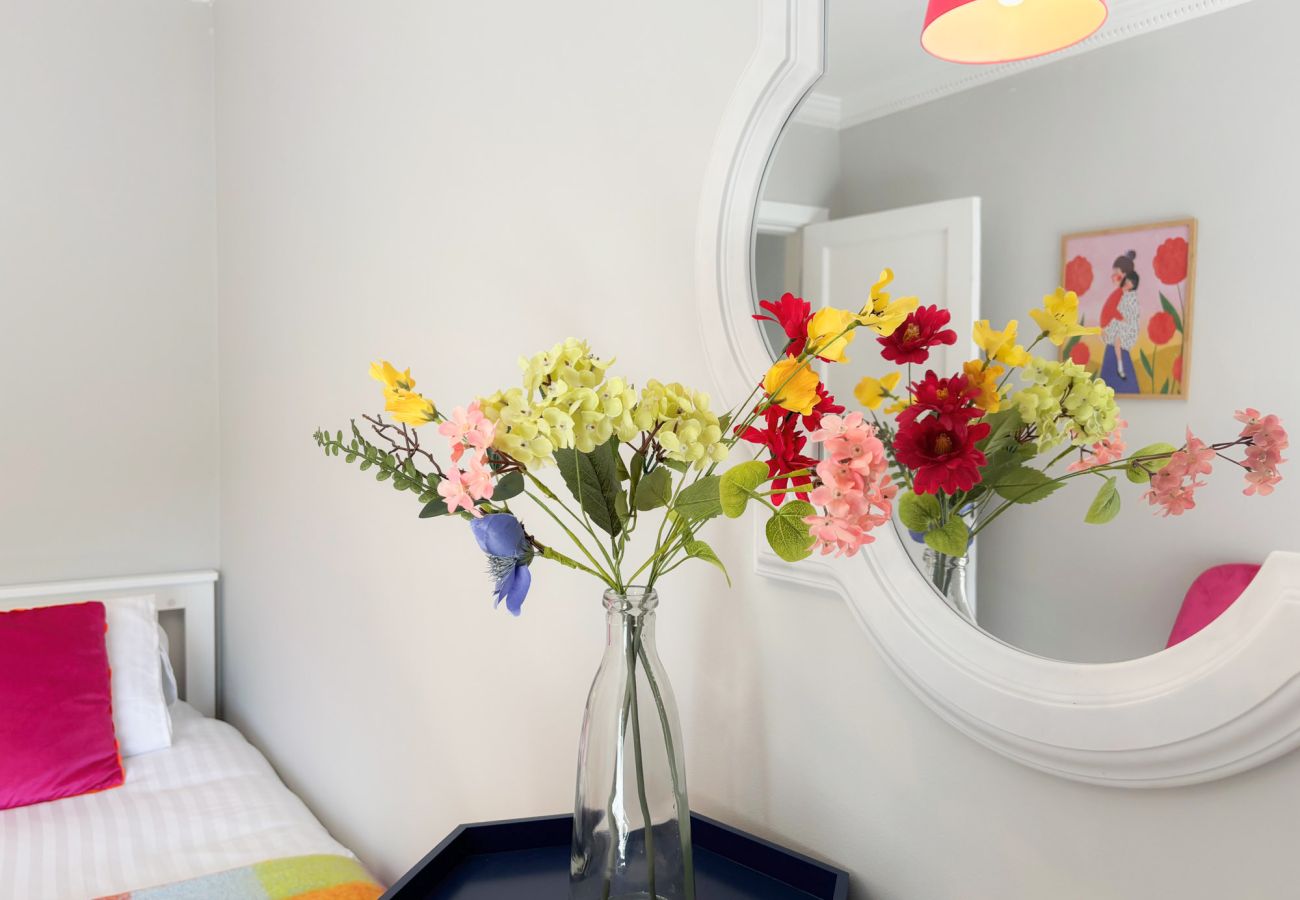 Luxurious Clifden Cottage. Colourful bright bedtroom