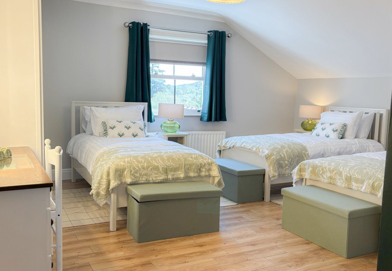 Luxurious Clifden Holiday Home. Triple attic room, tasteful bright wooden floors. 