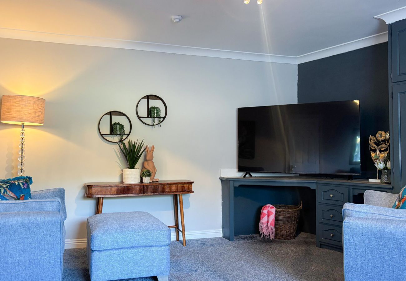 Luxurious Clifden Holiday Home.  Spacious Living room with plasma TV