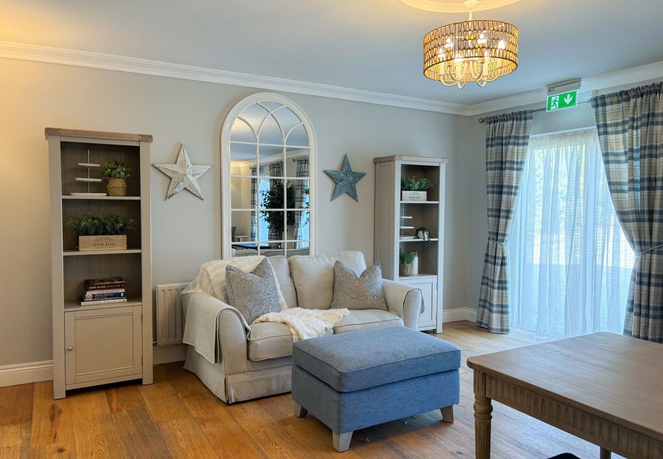 Luxurious Clifden Holiday Home. Comfortable couch, large window. 