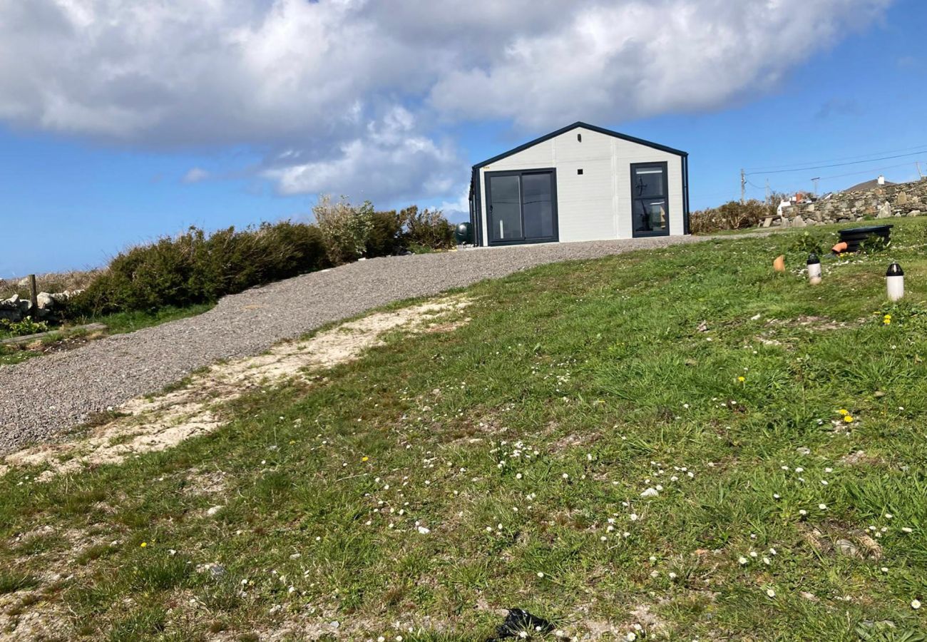 Claddaghduff Holiday Cabin. Family holiday home on elivated site bright with views. 