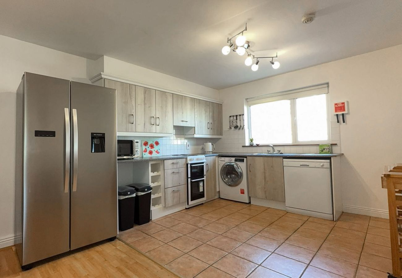 MooreBayHolidayVillage8D. Family holiday home Kilkee. Bright modern kitchen with large american style fridge